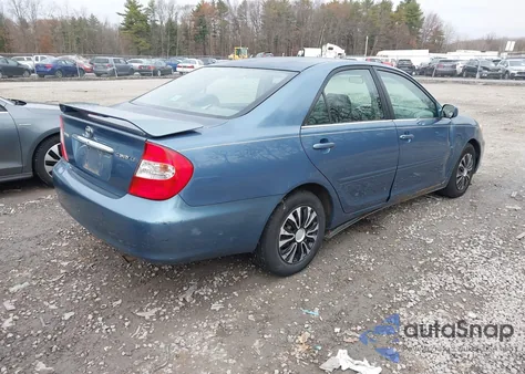 2003 Toyota Camry Le z USA, uszkodzony, nr VIN 4T1BE32K73U742821